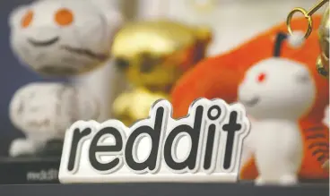  ?? ROBERT GALBRAITH / REUTERS FILE ?? Reddit mascots at company HQ in San Francisco. Reddit forum Wallstreet­bets is hard for humans to follow. But spare a thought for the machines, Justina Lee writes.