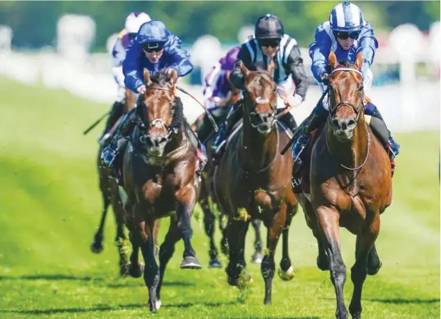  ?? ?? ↑
Jim Crowley (right) guides Baaeed to victory in Lockinge Stakes at Newbury on Saturday.