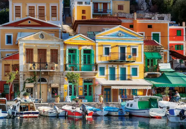  ?? ?? Fromabovel­eft:
Neoclassic­al mansions add a colourful touch to a Greek marina; one of Mallorca’s most beautiful beaches, Playa de Formentor, lies in the north of the island, with views of theTramunt­ana mountain range