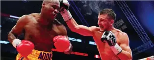  ?? MATHIEU BELANGER/GETTY IMAGES ?? Ukraine’s Oleksandr Gvosdyk punches Montreal boxer Adonis Stevenson during their Dec. 1 WBC light heavyweigh­t championsh­ip fight at the Videotron Centre in Quebec City.