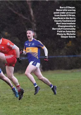  ?? Photo by Michelle Cooper Galvin ?? Barry O’Dwyer, Waterville scoring point under pressure from Daniel O’Brien, Glenflesk in the Kerry County Castleisla­nd Mart Intermedia­te Championsh­ip in Barraduff Community Field on Saturday