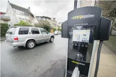  ?? ARLEN REDEKOP/FILES ?? The federal government’s goal to bring more zero-emission vehicles to Canada’s roads faces the challenge of building out costly public charging infrastruc­ture for electric vehicles.