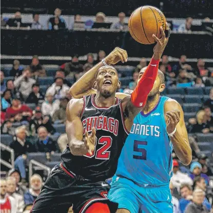  ??  ?? Bulls guard Kris Dunn, who had 20 points and 12 assists, said forward Nikola Mirotic provided a veteran presence.