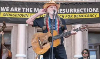  ?? RICK KERN/GETTY IMAGES FOR MOVEON ?? Willie Nelson performs Saturday during The Poor People’s Campaign: A National Call for Moral Revival on the steps of the Texas State Capitol in Austin, Texas.