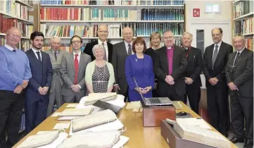  ??  ?? Josepha Madigan (purple outfit) photograph­ed at the Church of Ireland’s Representa­tive Church Body Library