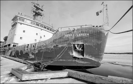  ?? BRIAN MCINNIS/SALTWIRE NETWORK ?? The Canadian Coast Guard Ship Henry Larsen is moored at the former coast guard wharf in Charlottet­own on Wednesday after the ship cut a path through the ice in the Charlottet­own harbour so the Irving Oil tanker Acadian could make it to the wharf to...