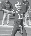  ?? MARK KONEZNY/USA TODAY SPORTS ?? Bills quarterbac­k Josh Allen throws a pass against the Seahawks on Sunday.