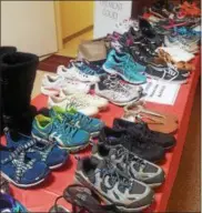  ?? BILL RETTEW JR. – DIGITAL FIRST MEDIA ?? Donated shoes at the Salvation Army in West Chester.