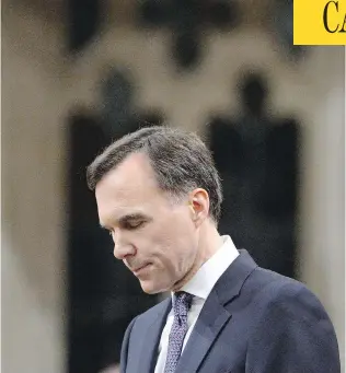  ?? ADRIAN WYLD / THE CANADIAN PRESS ?? Finance Minister Bill Morneau plainly believes he should be congratula­ted for his later efforts at damage control, writes the Post’s Andrew Coyne.