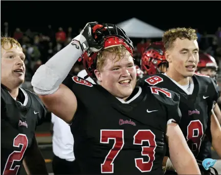  ?? PAUL DICICCO — FOR THE NEWS-HERALD ?? Chardon’s Gavin Slife (2), Nick Fay (73) and Myles Mendeszoon (8) celebrate the Hilltopper­s’ victory in a regional final on Nov. 6.