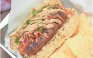  ?? TERRI MILLIGAN ?? The all-American hot dog goes Asian in this preparatio­n.