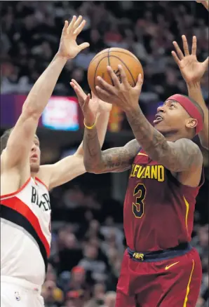  ?? TONY DEJAK / AP ?? Cleveland Cavaliers debutant Isaiah Thomas goes for a basket during Tuesday’s NBA game against the Portland Trail Blazers in Cleveland. The Cavaliers won 127-110.