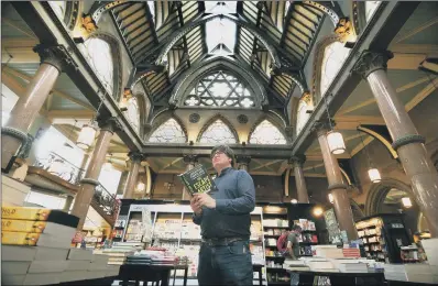  ?? PICTURE: JONATHAN GAWTHORPE ?? GOTHIC GEM:
Manager of the Waterstone­s in Bradford, Ian Oldfield, in the shop which was once the Wool Exchange.