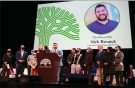  ?? ?? Nick Resnick speaks after taking the oath of office for the Oakland school board during an inaugurati­on ceremony at the Paramount Theater.