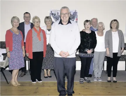  ??  ?? Kicker Father Lafferty thanks the church members who have helped him