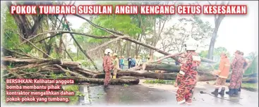  ??  ?? BERSIHKAN: Kelihatan anggota bomba membantu pihak kontraktor mengalihka­n dahan pokok-pokok yang tumbang.