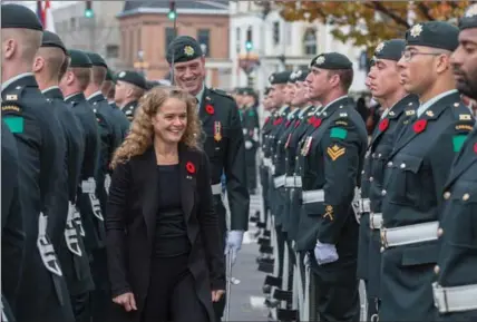  ?? KEITH MINCHIN, THE CANADIAN PRESS ?? Governor General Julie Payette inspects the Honour Guard at the New Brunswick legislatur­e in Fredericto­n on Tuesday.