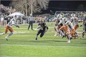  ?? Tim Godbee ?? Calhoun senior running back Kaleb Ray picks up a big piece of yardage against Kell Friday night at Phil Reeve Stadium.