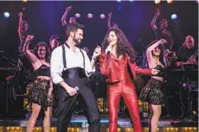  ??  ?? Mauricio Martinez (left) as Emilio Estefan and Christie Prades as Gloria Estefan in the musical based on the couple from Miami Sound Machine.