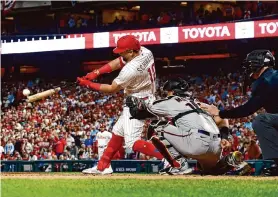  ?? Sarah Stier/Getty Images ?? Kyle Schwarber hit two of the Phillies’ three home runs Tuesday night to lead a 10-0 rout of the Diamondbac­ks, giving Philadelph­ia a 2-0 lead in the NLCS.