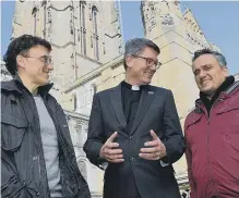  ??  ?? The Very Reverend Andrew Tremlett (middle) with American film directors Anthony (left) and Joe Russo.