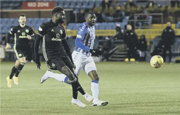  ??  ?? 0 Odsonne Edouard scores to make it 3-0 to Celtic against Kilmarnock as Neil Lennon’s men strolled to victory at Rugby Park