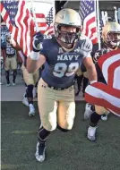  ?? PATRICK SMITH/GETTY IMAGES ?? Sean Reaver, seen taking the field on Nov. 14, 2015, never lost to archrival Army while playing for the Naval Academy.