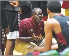  ?? (Arkansas Democrat-Gazette/Staci Vandagriff) ?? Coach Billy Dixon leads Pine Bluff against Lake Hamilton today in the Class 5A boys state championsh­ip game at Hot Springs. The Zebras will be going for their 14th state championsh­ip.