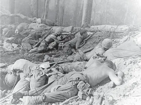  ??  ?? Members of Bob Allen’s unit under fire in Vietnam in November 1967.