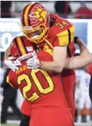  ?? | WORSOM ROBINSON/ FOR SUN- TIMES ?? Batavia players celebrate after beating Lake Zurich.