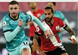  ?? GETTY IMAGES ?? Cover: Jordan Henderson (left) played at the back