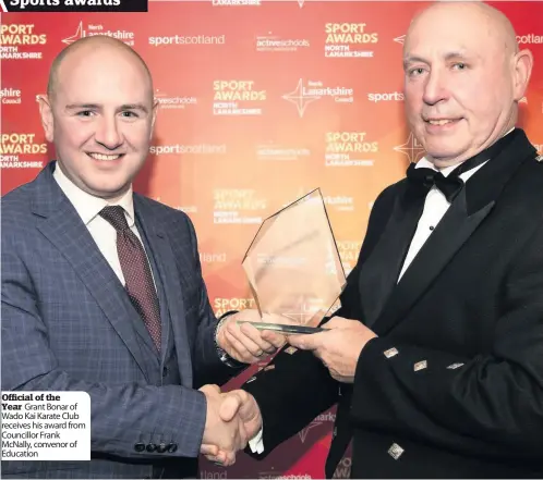  ??  ?? Official of the Year Grant Bonar of Wado Kai Karate Club receives his award from Councillor Frank Mcnally, convenor of Education