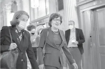  ?? J. SCOTT APPLEWHITE/AP ?? Sens. Susan Collins, center, and Dianne Feinstein arrive for a vote Thursday. During confirmati­on, Brett Kavanaugh assured Collins that the right to abortion was “settled law,” but his recent comments sounded a different note.