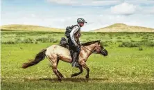  ?? Sarah Farnsworth / / New York Times ?? Bob Long of Boise, Idaho, beat 43 competitor­s to win the Mongol Derby. The 1,000-kilometer race across the steppes of Mongolia traces the former mail routes of Genghis Khan.