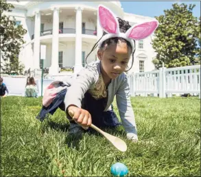  ?? Andrew Harnik / Associated Press file photo ?? Chloebella Frazier, 4, of Washington, D.C., takes part in the annual White House Easter Egg Roll on the South Lawn of the White Houseon April 22, 2019.