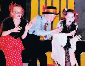  ?? 050617ANNE_07 ?? Rachel Clark (Miss Hannigan), Darryl Carrick (Rooster) and Anna Cowie (Lily