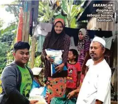  ?? FOTO ?? BARANGAN
diagihkan sebagai barang
bantuan.