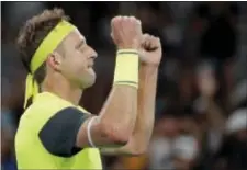  ?? VINCENT THIAN — THE ASSOCIATED PRESS ?? Tennys Sandgren celebrates after beating Austria’s Dominic Thiem in a fourth round match at the Australian Open.