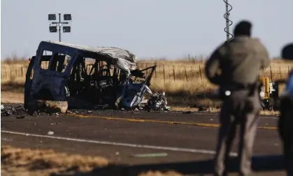  ?? Photograph: Eli Hartman/AP ?? Texas officials look over the scene of the fatal car wreck.