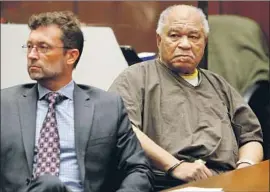  ?? ?? SAM LITTLE, right, in court in 2014, where he was sentenced to prison. Little, who died in 2020, gave sometimes vivid but also incomplete details of his crimes.