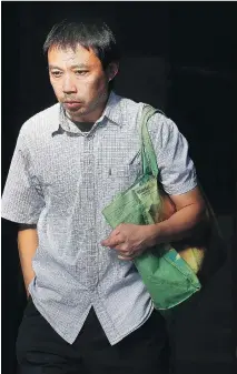  ?? TONY CALDWELL ?? Jie Xiao leaves the Ottawa court house Thursday. The former personal support worker pleaded guilty to punching Georges Karam in the Gerry J. Armstrong long-term care home.