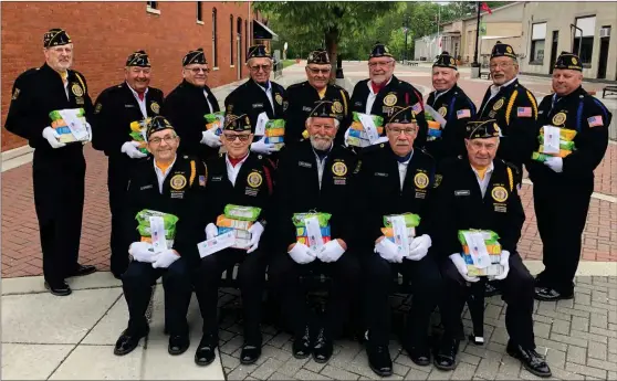  ?? (PHOTO SUBMITTED) ?? Standing: Carl Stevens, Bob Hoffman, Ken Meyer, Ken Uhrick, Dave Scheumann, Steve Halchuck, Bob Durbin, Tim Bolinger, John Yoquelet. Seated: Norb Bleeke. Fritz Bultemeir, Wes Worth, Ted Buuck, Lew Seffernick All of the American Legion, Post #43 Color Guard members are shown with their GS goodies with the `thank you for your service' notes from the Girl Scouts (GS).