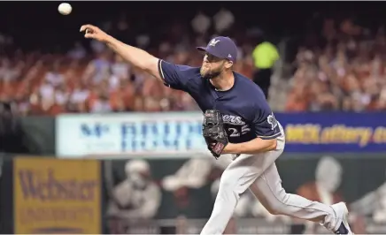  ?? SCOTT ROVAK / USA TODAY SPORTS ?? Jordan Lyles was 1-0 with a 3.31 ERA in 11 appearance­s for the Brewers last year.