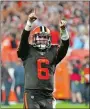  ?? RON SCHWANE/AP PHOTO ?? Browns quarterbac­k Baker Mayfield celebrates a touchdown against the Jets Thursday in Cleveland.