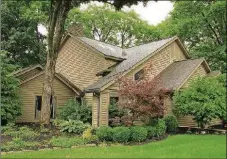  ?? CONTRIBUTE­D PHOTOS BY KATHY TYLER ?? The cedar-sided 2-story has about 3,300 sq. ft. of living space. The house sits on a cul-de-sac within the Hidden Hills subdivisio­n of Centervill­e. It has a 3-car, side-entry garage.