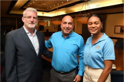  ?? Jamaica Observer Monday Exchange. (Photo: Joseph Wellington) ?? President and chief executive officer of Sagicor Group Jamaica and Chairman of Sagicor Foundation Christophe­r Zacca (centre) flanked by Ben Rapp (left), founder and principal of Securys Limited, and Kadia Harris, senior brand manager — beverages at Grace Foods and Services Limited, at this week’s