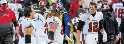  ?? CHARLES REX ARBOGAST THE ASSOCIATED PRESS ?? Bucs QB Tom Brady (12) yells at members of his offensive line as they walk off the field in the second half against the Bears in Chicago on Thursday night.