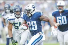  ?? WESLEY HITT/GETTY IMAGES ?? Demarco Murray scored a 75-yard TD in the second half as the Tennessee Titans pulled away from Seattle Sunday.