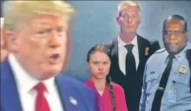  ?? REUTERS ?? Swedish activist Greta Thunberg (centre) watches as US President Donald Trump enters the United Nations to speak with reporters in New York City.