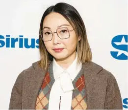  ?? JAMIE MCCARTHY/GETTY ?? Lulu Wang, director of “Expats,” a six-part limited series on Amazon Prime Video, visits SiriusXM Studios on Jan. 25 in New York.